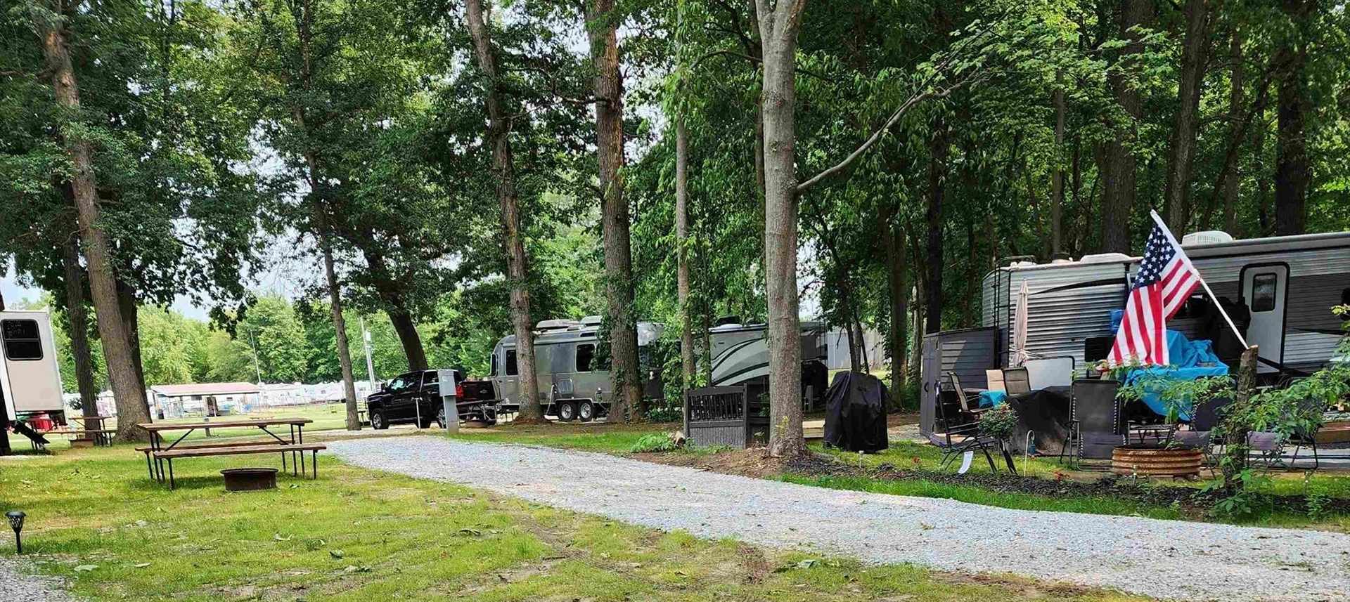 Back-In RV site and RV's at Gotta Getaway RV Park